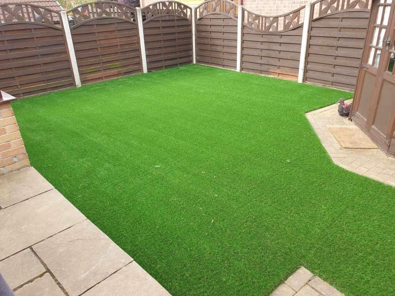 Artificial grass patio installation